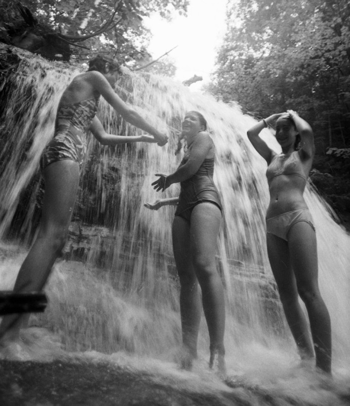 Bathers soap up at Sable Falls, Grand Marais; 1976.