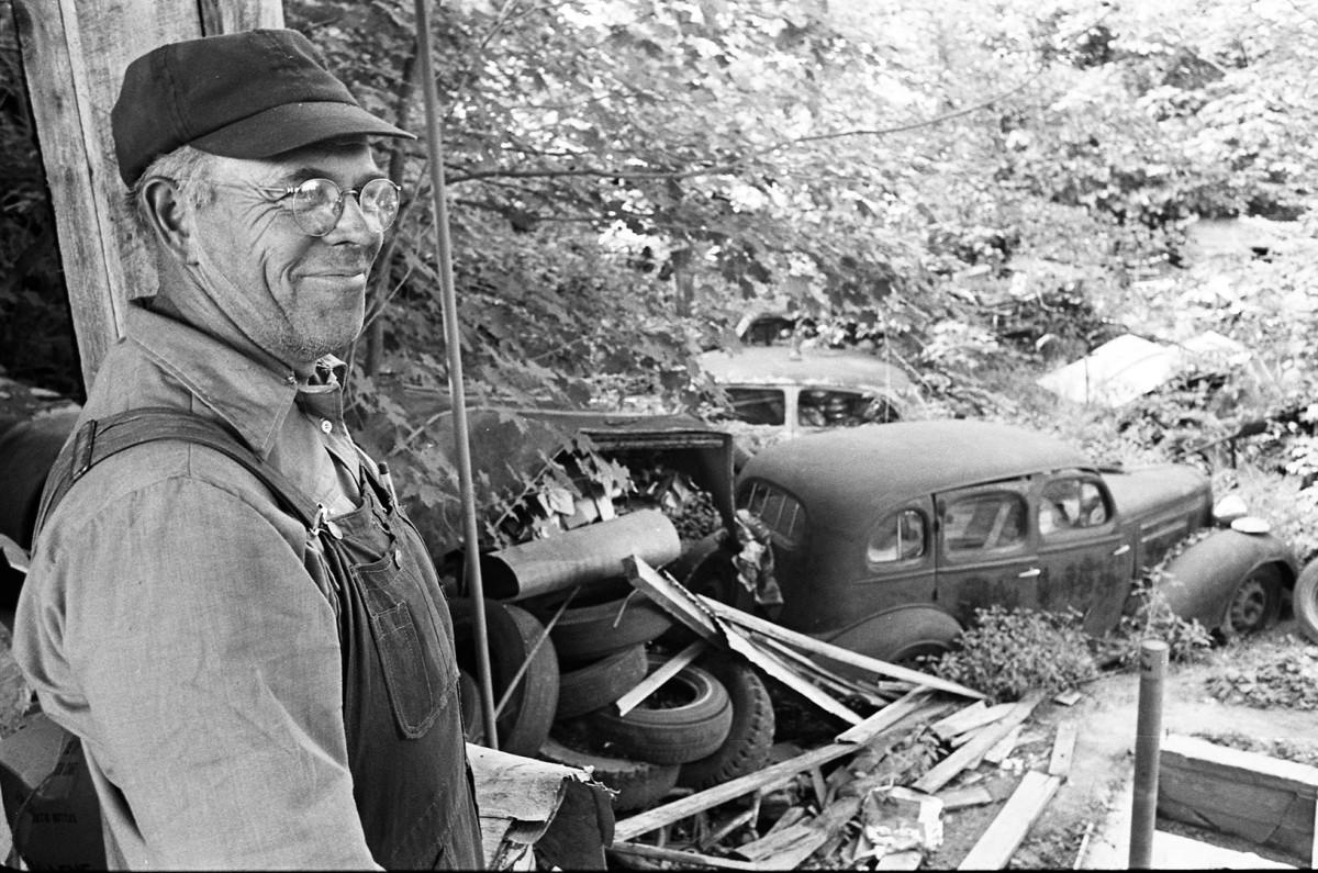 Cloyse Webster is a proud junkyard owner, Freemont; 1976.Guide to Michigan;