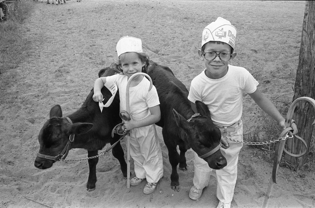 Jackie and Tommy Durham compete with Velvet and Midnight at the West Michigan Fair, Ludington; 1976.Guide to Michigan;
