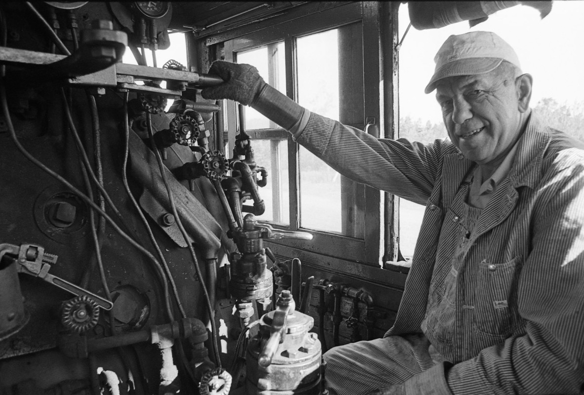 Marquette Iron Horse Engineer Louis Beandion shows his work station; 1976.Guide to Michigan;