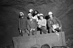 Michigan Technical University geology students, calling themselves Midnight Miners Inc., with guests, break into a 100 year old abandoned Keweenaw copper mine; 1976.Guide to Michigan; 1976. Tom, Steve, Owen