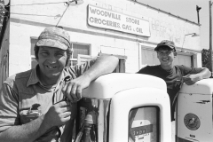 Chris and Les Swiger man the pumps at the Woodville Store and gas station, Woodville; 1976.Guide to Michigan;.