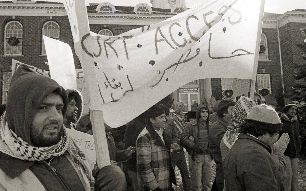 Demonstrators march at Dearborn City Hall in support of ACCESS after funding cuts were threatened, 1977.