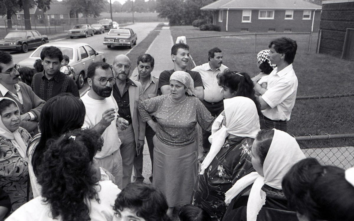 Residents get help from ACCESS after the city closed their apartment building; 1990. Hassan Jaber.