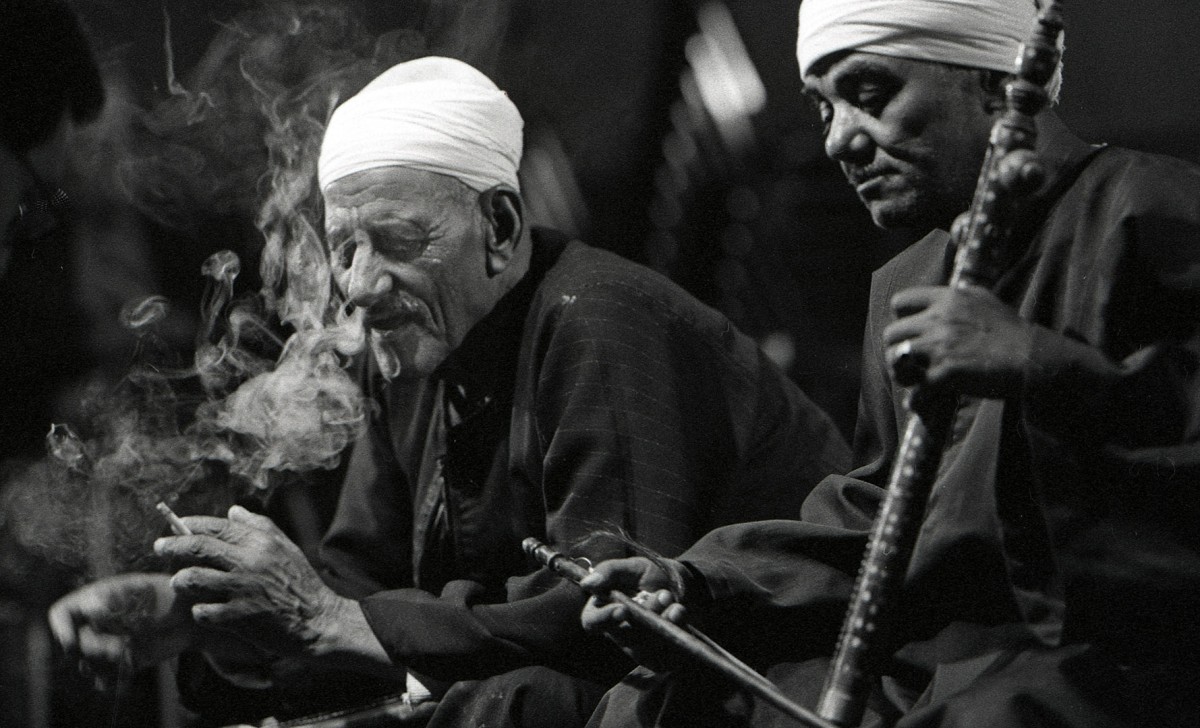 Egyptian story teller Sheik Ghanam Mansour, hosted by ACCESS performs a ballad; 1993.