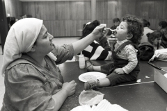 Residents get help from ACCESS after the city closed their apartment building; 1990.