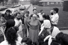 Residents get help from ACCESS after the city closed their apartment building; 1990. Hassan Jaber.