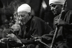 Egyptian story teller Sheik Ghanam Mansour, hosted by ACCESS performs a ballad; 1993.