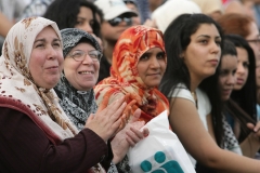 ArabInt09Fest36:      	The audience applauds speakers introducing a long line of dignitaries for opening ceremonies in 2009 at the Arab International Festival.