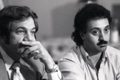 Abdeen Jabara and Ismael Ahmed listen to questions at a press conference, 1981.